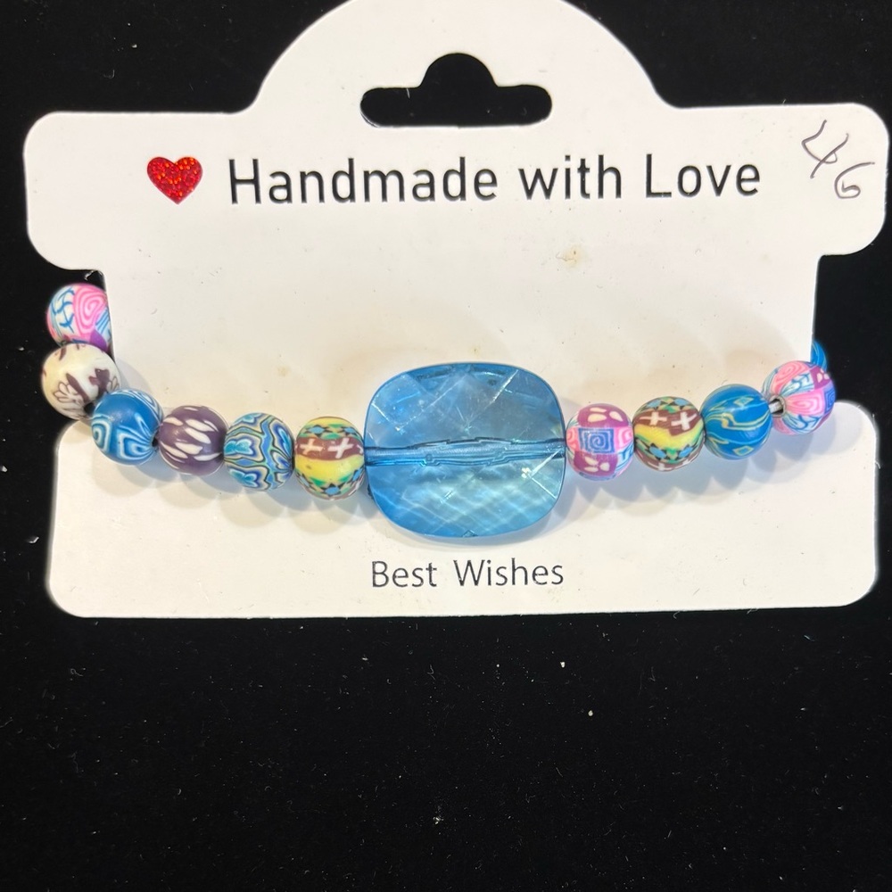 Colorful Beaded Bracelet with Blue Accent multicolor millefiori style beads.